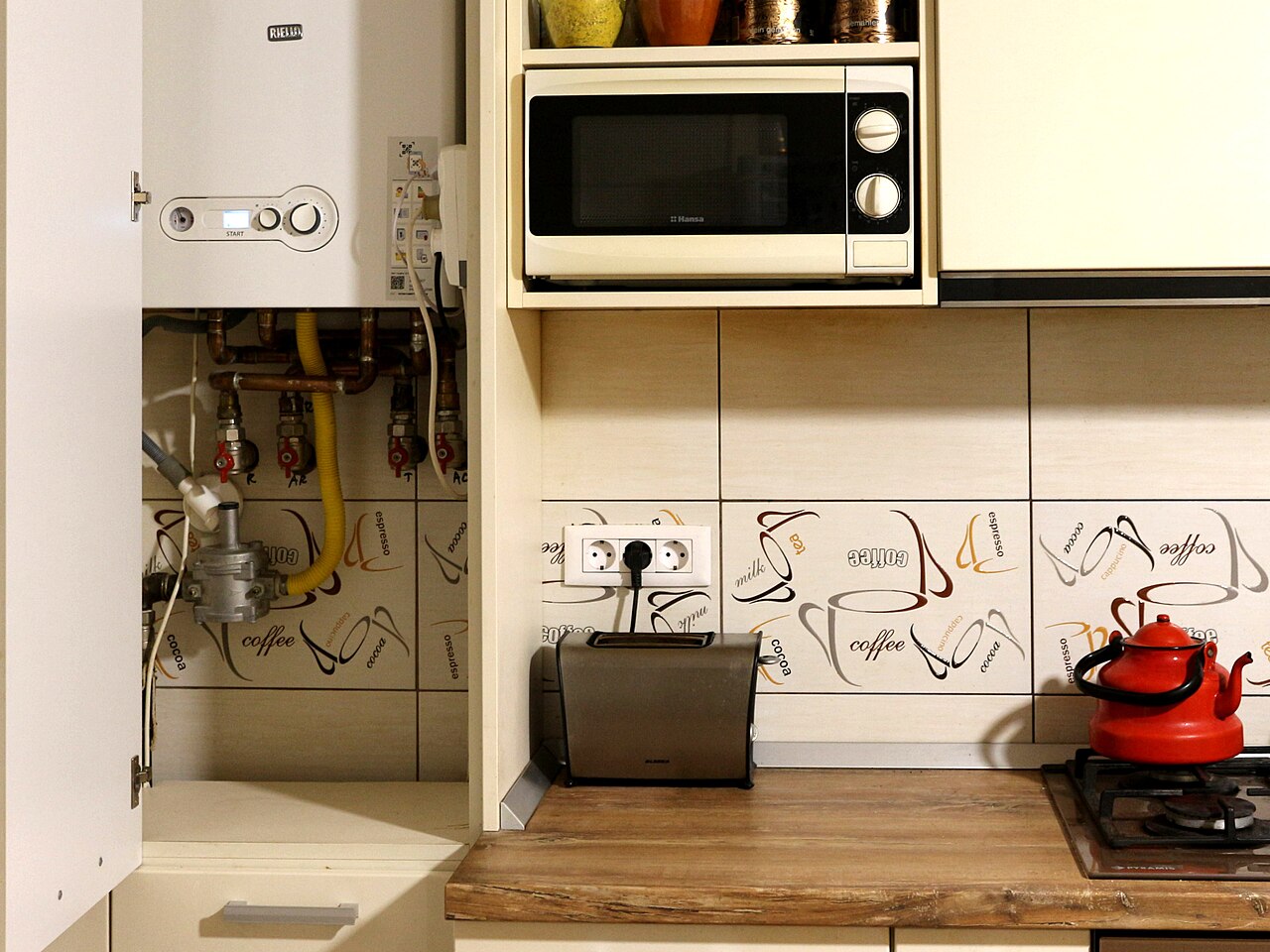 Old inefficient boiler with exposed pipework